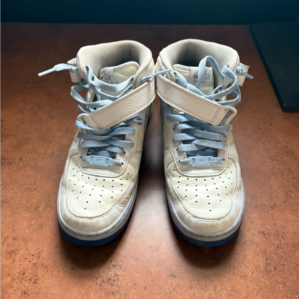 Nike women’s White and Light Blue Sneakers